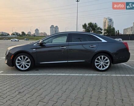 Серый Кадиллак ХТС, объемом двигателя 3.56 л и пробегом 135 тыс. км за 16200 $, фото 1 на Automoto.ua