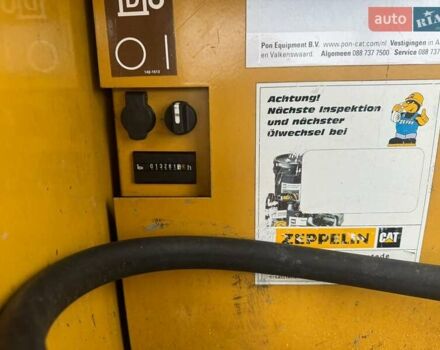 Желтый Катерпиллер 312, объемом двигателя 4 л и пробегом 13 тыс. км за 35000 $, фото 1 на Automoto.ua