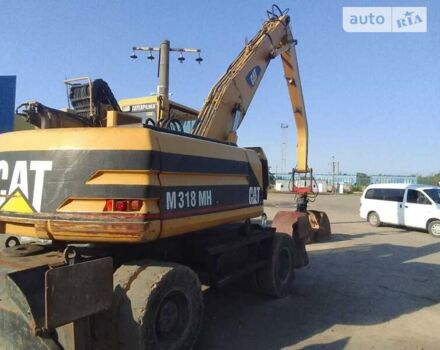 Катерпиллер 318, объемом двигателя 0 л и пробегом 103 тыс. км за 55000 $, фото 6 на Automoto.ua