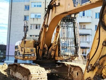 Жовтий Катерпіллер 318, об'ємом двигуна 0 л та пробігом 13 тис. км за 12000 $, фото 1 на Automoto.ua