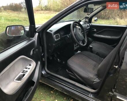 Черный Чери Амулет, объемом двигателя 1.6 л и пробегом 92 тыс. км за 2000 $, фото 6 на Automoto.ua