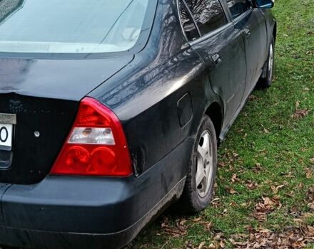 Чорний Чері Істар, об'ємом двигуна 2 л та пробігом 216 тис. км за 2400 $, фото 2 на Automoto.ua