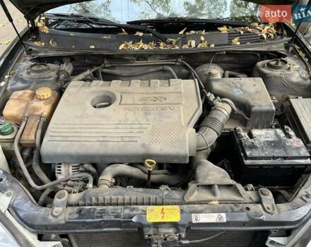 Чорний Чері Істар, об'ємом двигуна 2 л та пробігом 123 тис. км за 2700 $, фото 2 на Automoto.ua