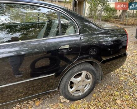 Чорний Чері Істар, об'ємом двигуна 2 л та пробігом 123 тис. км за 2700 $, фото 1 на Automoto.ua