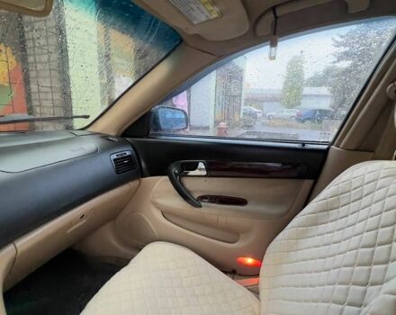 Чорний Чері Істар, об'ємом двигуна 2 л та пробігом 283 тис. км за 1100 $, фото 1 на Automoto.ua