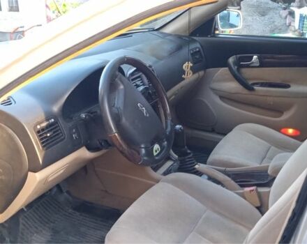 Серый Чери Истар, объемом двигателя 2 л и пробегом 270 тыс. км за 2593 $, фото 4 на Automoto.ua