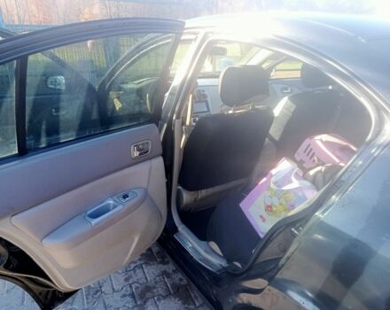 Черный Чери Элара, объемом двигателя 2 л и пробегом 98 тыс. км за 1900 $, фото 4 на Automoto.ua