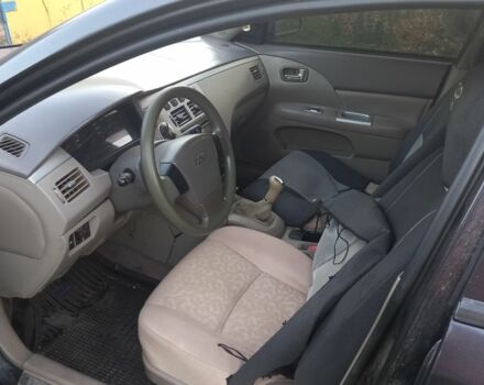 Черный Чери Элара, объемом двигателя 2 л и пробегом 213 тыс. км за 1500 $, фото 10 на Automoto.ua