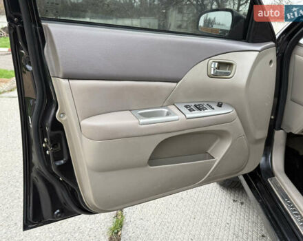 Чорний Чері Елара, об'ємом двигуна 1.97 л та пробігом 185 тис. км за 1950 $, фото 8 на Automoto.ua