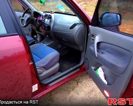 Красный Чери Tiggo 2, объемом двигателя 2 л и пробегом 247 тыс. км за 3500 $, фото 9 на Automoto.ua