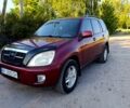 Красный Чери Tiggo 7, объемом двигателя 2 л и пробегом 147 тыс. км за 3999 $, фото 1 на Automoto.ua