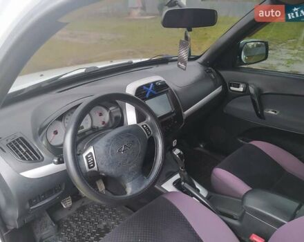 Білий Чері Тігго, об'ємом двигуна 1.6 л та пробігом 168 тис. км за 4500 $, фото 11 на Automoto.ua