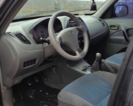 Черный Чери Тигго, объемом двигателя 2 л и пробегом 220 тыс. км за 3000 $, фото 7 на Automoto.ua