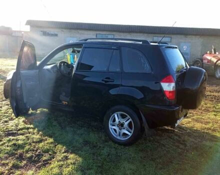 Черный Чери Тигго, объемом двигателя 2 л и пробегом 194 тыс. км за 2610 $, фото 1 на Automoto.ua