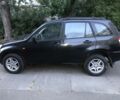 Чорний Чері Тігго, об'ємом двигуна 2 л та пробігом 76 тис. км за 4000 $, фото 1 на Automoto.ua