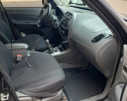 Черный Чери Тигго, объемом двигателя 2 л и пробегом 232 тыс. км за 3000 $, фото 5 на Automoto.ua