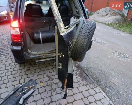 Чорний Чері Тігго, об'ємом двигуна 2 л та пробігом 231 тис. км за 2100 $, фото 13 на Automoto.ua