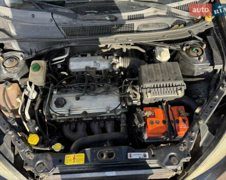 Черный Чери Тигго, объемом двигателя 2.4 л и пробегом 333 тыс. км за 3000 $, фото 8 на Automoto.ua