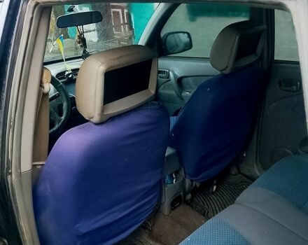 Чорний Чері Тігго, об'ємом двигуна 2 л та пробігом 150 тис. км за 3420 $, фото 5 на Automoto.ua