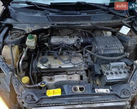 Чорний Чері Тігго, об'ємом двигуна 2 л та пробігом 231 тис. км за 2100 $, фото 4 на Automoto.ua