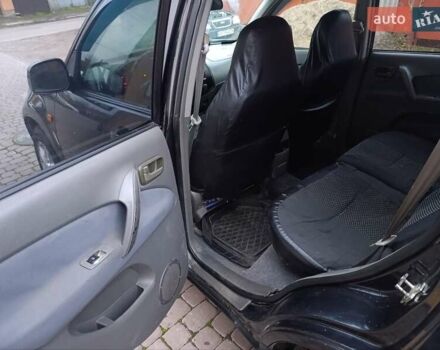 Чорний Чері Тігго, об'ємом двигуна 2 л та пробігом 231 тис. км за 2100 $, фото 28 на Automoto.ua