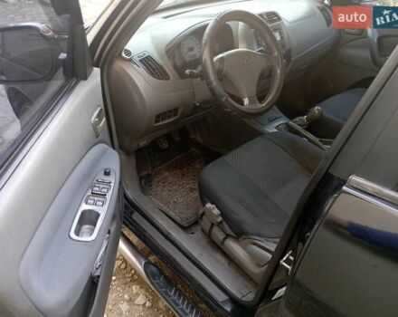 Чорний Чері Тігго, об'ємом двигуна 2 л та пробігом 169 тис. км за 4200 $, фото 4 на Automoto.ua