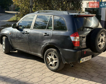 Черный Чери Тигго, объемом двигателя 2.4 л и пробегом 333 тыс. км за 3000 $, фото 6 на Automoto.ua