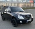Черный Чери Тигго, объемом двигателя 2 л и пробегом 250 тыс. км за 4000 $, фото 1 на Automoto.ua