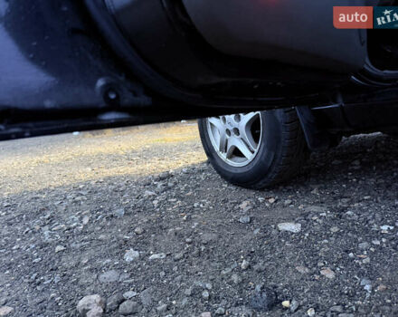 Черный Чери Тигго, объемом двигателя 2 л и пробегом 259 тыс. км за 3350 $, фото 13 на Automoto.ua