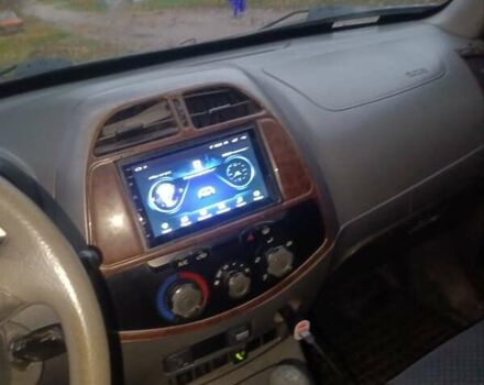 Черный Чери Тигго, объемом двигателя 2 л и пробегом 259 тыс. км за 4200 $, фото 2 на Automoto.ua