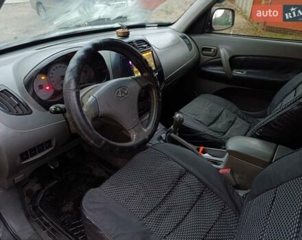 Чорний Чері Тігго, об'ємом двигуна 2 л та пробігом 231 тис. км за 2100 $, фото 29 на Automoto.ua