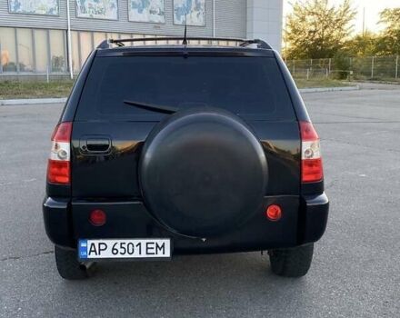 Черный Чери Тигго, объемом двигателя 2 л и пробегом 250 тыс. км за 4000 $, фото 2 на Automoto.ua