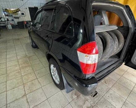 Черный Чери Тигго, объемом двигателя 2 л и пробегом 252 тыс. км за 2900 $, фото 5 на Automoto.ua