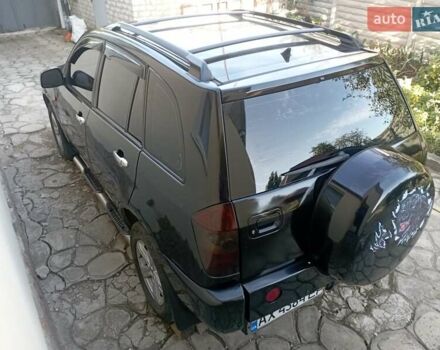 Чорний Чері Тігго, об'ємом двигуна 2 л та пробігом 169 тис. км за 4200 $, фото 9 на Automoto.ua