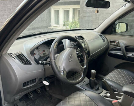 Черный Чери Тигго, объемом двигателя 2 л и пробегом 167 тыс. км за 3500 $, фото 10 на Automoto.ua