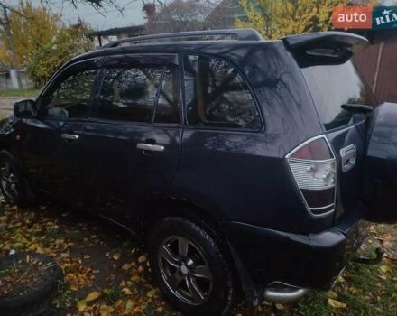 Черный Чери Тигго, объемом двигателя 2 л и пробегом 259 тыс. км за 4200 $, фото 4 на Automoto.ua