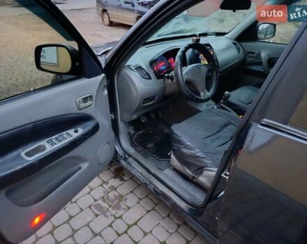 Чорний Чері Тігго, об'ємом двигуна 2 л та пробігом 231 тис. км за 2100 $, фото 30 на Automoto.ua