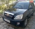 Чорний Чері Тігго, об'ємом двигуна 2 л та пробігом 169 тис. км за 4200 $, фото 1 на Automoto.ua