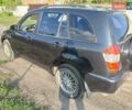 Чорний Чері Тігго, об'ємом двигуна 2 л та пробігом 125 тис. км за 3850 $, фото 8 на Automoto.ua