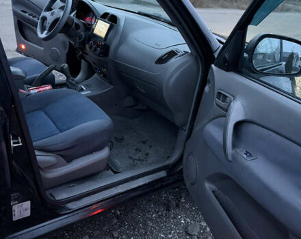 Черный Чери Тигго, объемом двигателя 2 л и пробегом 259 тыс. км за 3350 $, фото 20 на Automoto.ua