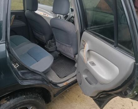 Черный Чери Тигго, объемом двигателя 2 л и пробегом 315 тыс. км за 3000 $, фото 2 на Automoto.ua