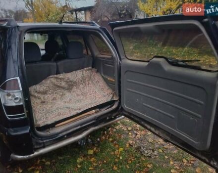 Черный Чери Тигго, объемом двигателя 2 л и пробегом 259 тыс. км за 4200 $, фото 1 на Automoto.ua