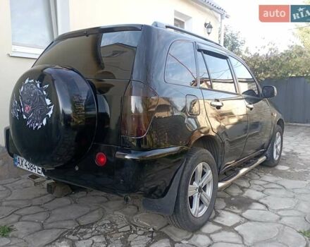 Чорний Чері Тігго, об'ємом двигуна 2 л та пробігом 169 тис. км за 4200 $, фото 10 на Automoto.ua