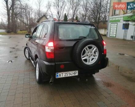 Чорний Чері Тігго, об'ємом двигуна 2 л та пробігом 248 тис. км за 4100 $, фото 5 на Automoto.ua