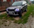 Черный Чери Тигго, объемом двигателя 2 л и пробегом 240 тыс. км за 2600 $, фото 1 на Automoto.ua