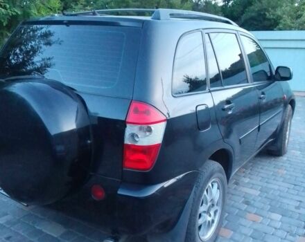 Черный Чери Тигго, объемом двигателя 2.4 л и пробегом 180 тыс. км за 4000 $, фото 2 на Automoto.ua