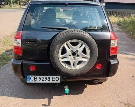 Чорний Чері Тігго, об'ємом двигуна 2 л та пробігом 245 тис. км за 3600 $, фото 1 на Automoto.ua