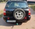 Чорний Чері Тігго, об'ємом двигуна 2 л та пробігом 245 тис. км за 3600 $, фото 1 на Automoto.ua