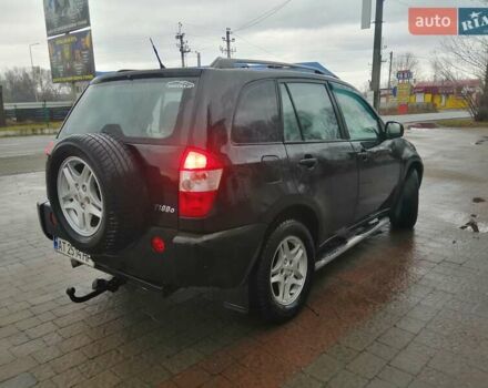 Чорний Чері Тігго, об'ємом двигуна 2 л та пробігом 248 тис. км за 4100 $, фото 7 на Automoto.ua