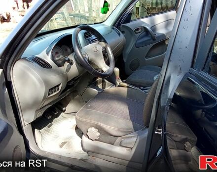 Черный Чери Тигго, объемом двигателя 2 л и пробегом 278 тыс. км за 4200 $, фото 4 на Automoto.ua